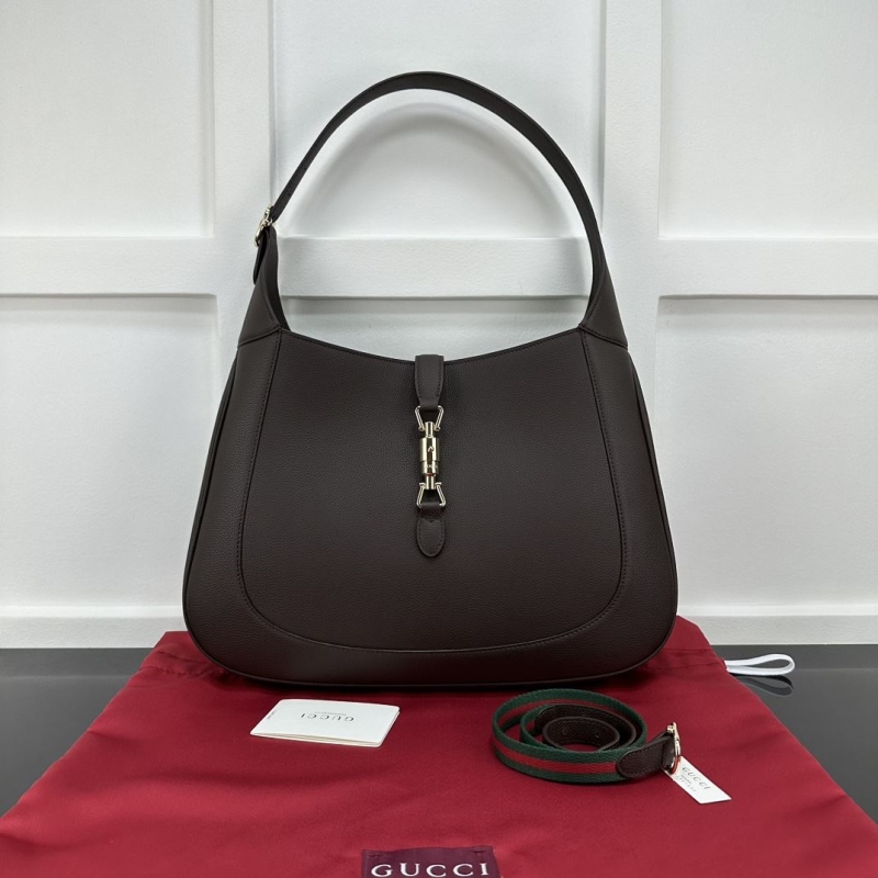 G*u*i top handle bags